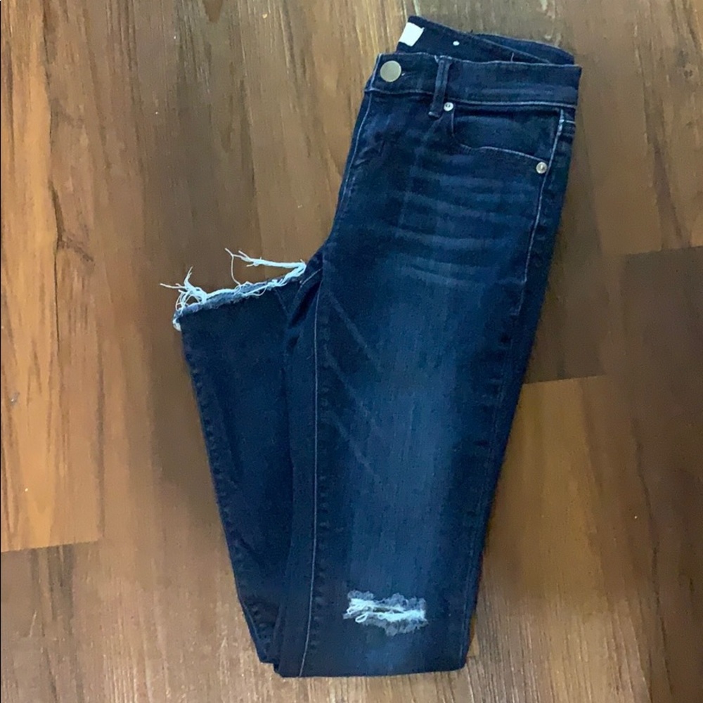 Dark wash open hem ripped skinny jeans